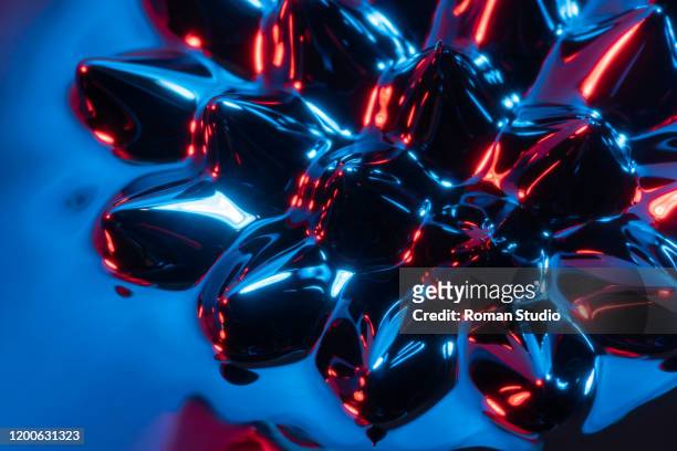 sculpture of ferrofluid induced by a neodymium magnet - ferro metal fotografías e imágenes de stock