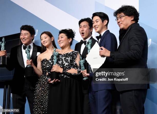 Song Kang Ho, So-dam Park, Jeong-eun Lee, Sun-kyun Lee, Woo-sik Choi, and Bong Joon-ho, winners of Outstanding Performance by a Cast in a Motion...