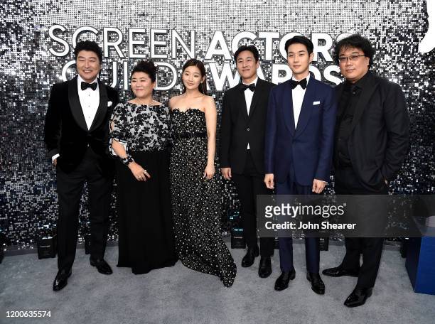 Kang-Ho Song, Lee Sun-kyun, Lee Jung Eun, Choi Woo-shik, Park So-dam, and Bong Joon-ho attend the 26th Annual Screen Actors Guild Awards at The...