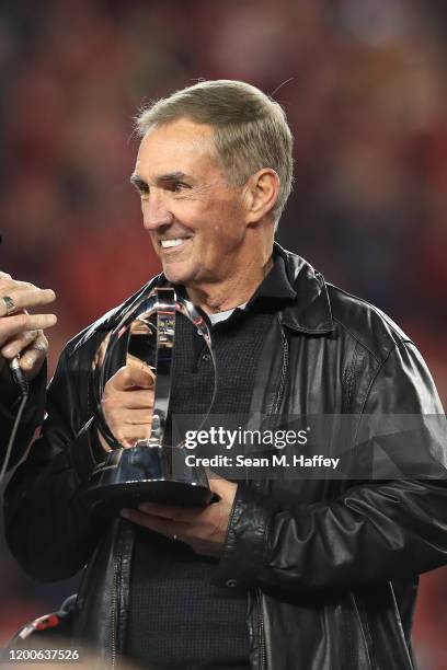 Former NFL head coach Mike Shanahan, father of head coach Kyle Shanahan of the San Francisco 49ers, holds the George Halas Trophy after the NFC...