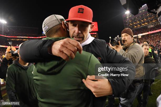 Head coach Kyle Shanahan of the San Francisco 49ers hugs head coach Matt LaFleur of the Green Bay Packers after winning the NFC Championship game...