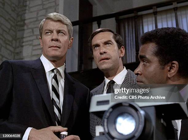 Peter Graves as James Phelps, Martin Landau as Rollin Hand and Greg Morris as Barney Collier in the Mission Impossible episode, "Live Bait" Original...