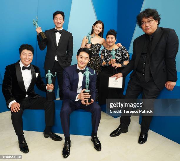 Song Kang-ho, Lee Sun-kyun, Choi Woo-shik, Park So-dam, Lee Jeong-eun, and Bong Joon-ho, winner of the Outstanding Performance by a Cast in a Motion...