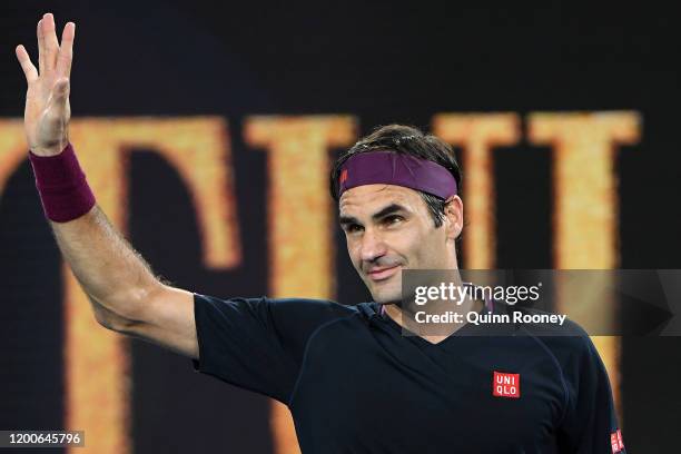 Roger Federer of Switzerland celebrates winning match point during his Men's Singles first round match against Steve Johnson of the United States of...