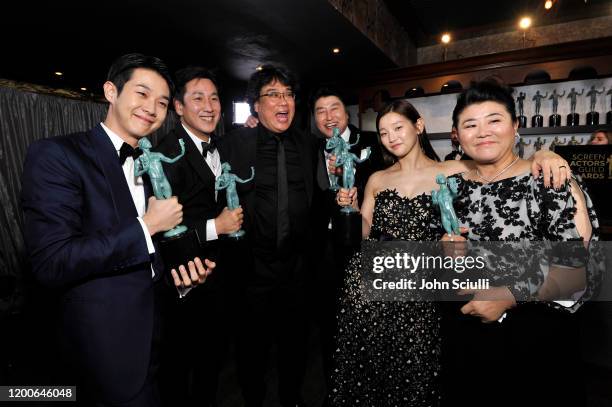 Choi Woo-shik, Lee Sun-kyun, Bong Joon-ho, Song Kang Ho, Park So-dam, and Jeong-eun Lee winners of Outstanding Performance by a Cast in a Motion...