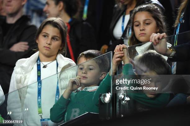 The children of Roger Federer of Switzerland, Charlene, Myla, Lenny and Leo are seen during the Men's Singles first round match between Roger Federer...
