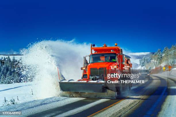 snow plow colorado highway usa - plowing stock pictures, royalty-free photos & images