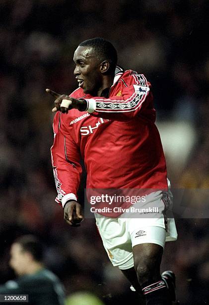 Dwight Yorke of Manchester United celebrates his goal in an FA Carling Premiership match against Blackburn at Old Trafford in Manchester, England....