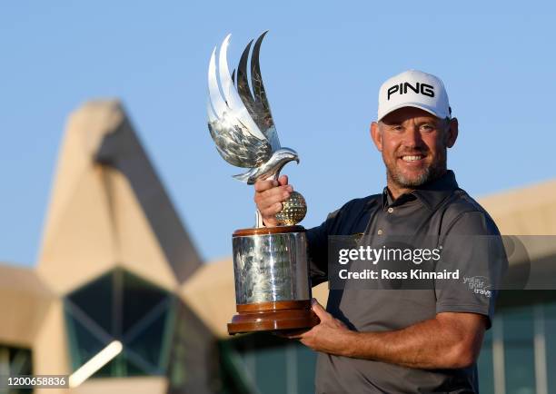 Lee Westwood of England poses with the trophy after the final round of the Abu Dhabi HSBC Championship at Abu Dhabi Golf Club on January 19, 2020 in...