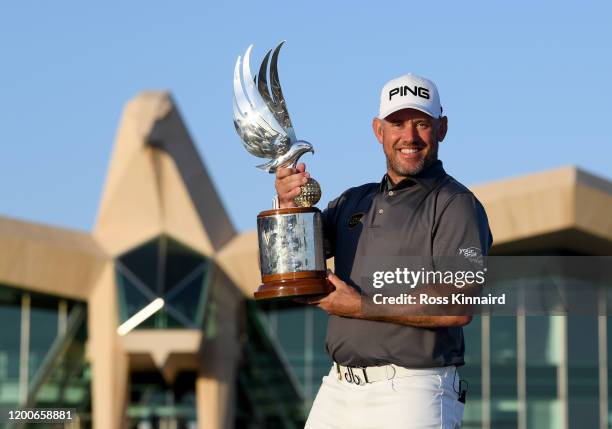 Lee Westwood of England poses with the trophy after the final round of the Abu Dhabi HSBC Championship at Abu Dhabi Golf Club on January 19, 2020 in...