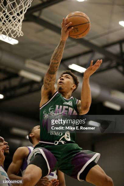 February 13: Wisconsin Herd guard Jaylen Adams goes to the basket as the Greensboro Swarm defends in a NBA G-League game on February 13, 2020 at the...