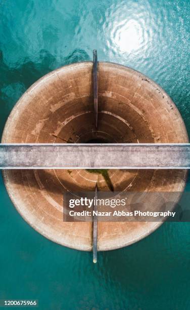 looking down at spillway dam. - hydroelectric power stock pictures, royalty-free photos & images