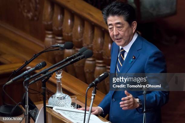 Japan's Prime Minister Shinzo Abe delivers his policy speech at the lower house of the parliament on January 20, 2020 in Tokyo, Japan. The Japanese...