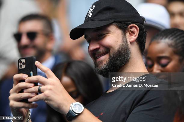 Alexis Ohanian, husband of Serena Williams filming her interview after winning her first round match against Anastasia Potapova of Russia on day one...