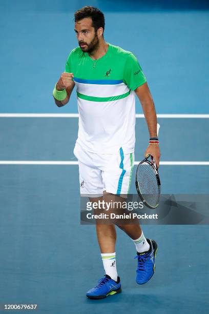Salvatore Caruso of Italy celebrastes in his Men's Singles first round match against Stefanos Tsitsipas of Greece on day one of the 2020 Australian...