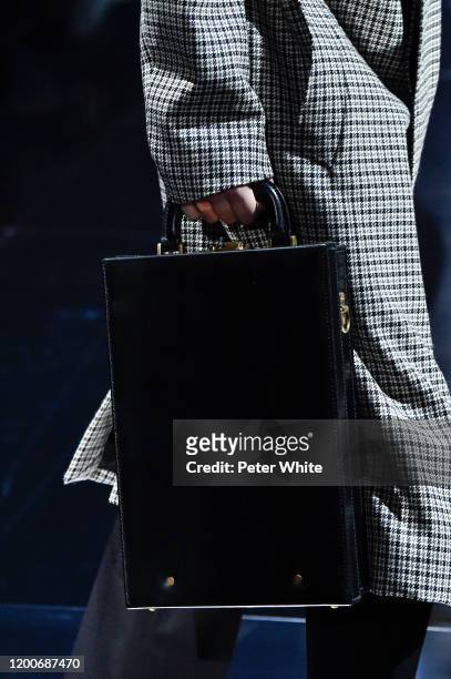 Model, bag detail, walks the runway during the Dunhill Menswear Fall/Winter 2020-2021 show as part of Paris Fashion Week on January 19, 2020 in...