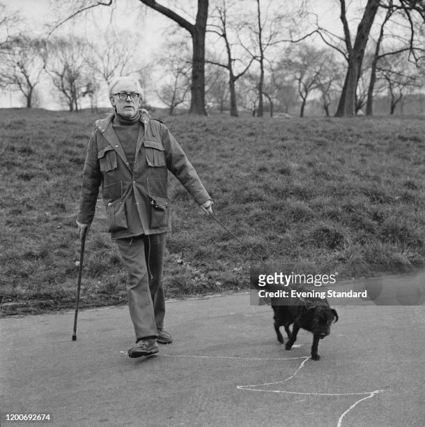 British Labour Party politician Michael Foot walking his dog on Hampstead Heath, London, England, March 1976.
