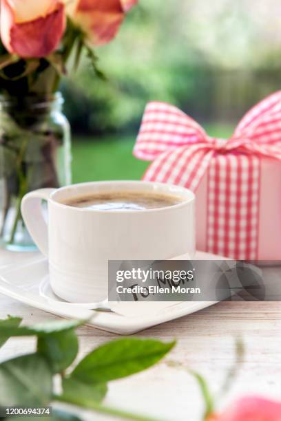 mother's day morning with gift and flowers - stock photo - mother's day breakfast stock pictures, royalty-free photos & images