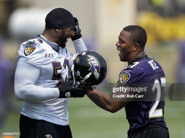 Lineback Ray Lewis and running back Ray Rice of the Baltimore Ravens joke around during training camp on July 29, 2011 in Owings Mills, Maryland.