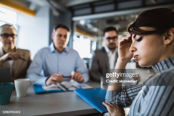 young worried woman having a job interview in the office. - job interview nervous stock pictures, royalty-free photos & images