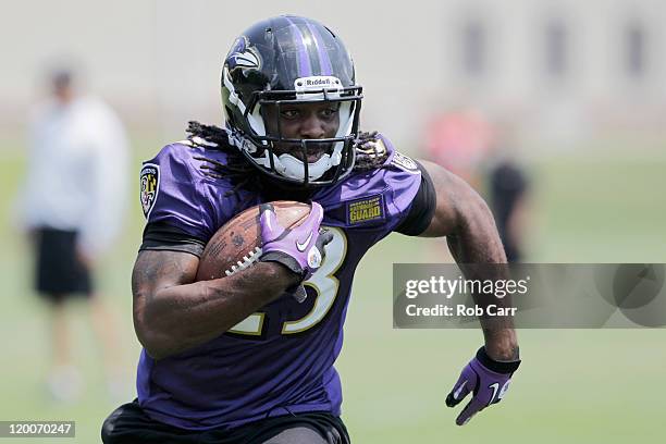 Running back Damien Berry of the Baltimore Ravens carries the ball during training camp on July 29, 2011 in Owings Mills, Maryland.