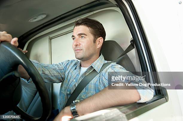 young adult man driving truck - essex county new jersey stock pictures, royalty-free photos & images