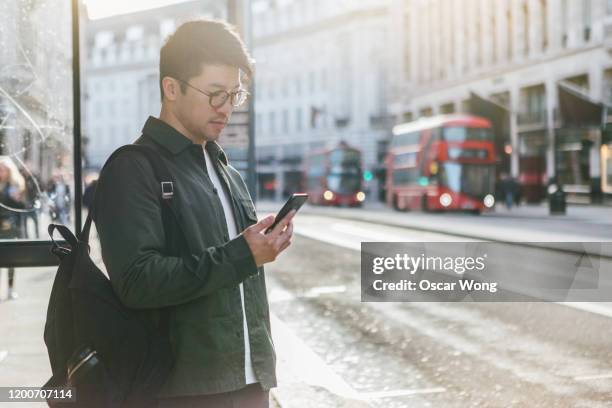 Man Using Mobile App Man Using App Photos and Premium High Res Pictures - Getty Images