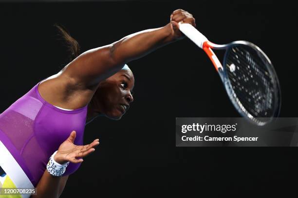 Sloane Stephens of the United States serves during her Women's Singles first round match against Shuai Zhang of China on day one of the 2020...