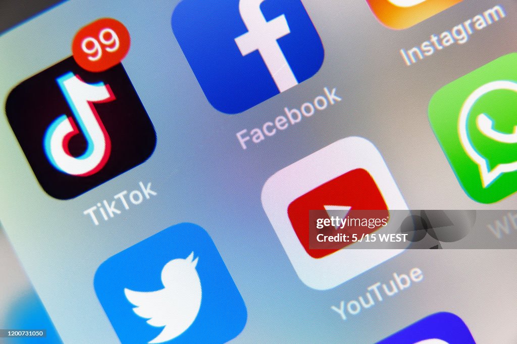 TikTok and Facebook, YouTube application on screen Apple iPhone XR