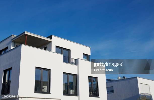 modern white family house and blue sky - facade stock pictures, royalty-free photos & images