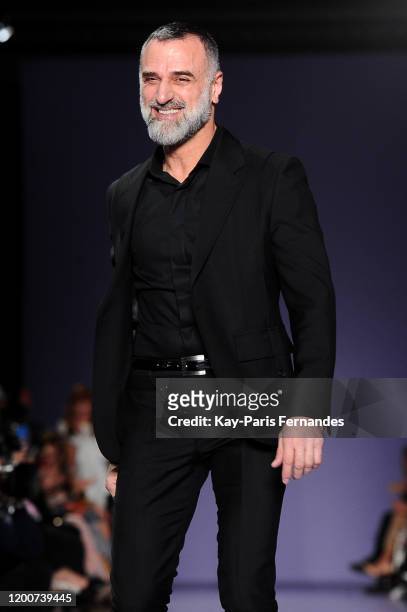 Designer Georges Hobeika walks the runway during the Georges Hobeika Haute Couture Spring/Summer 2020 show as part of Paris Fashion Week on January...