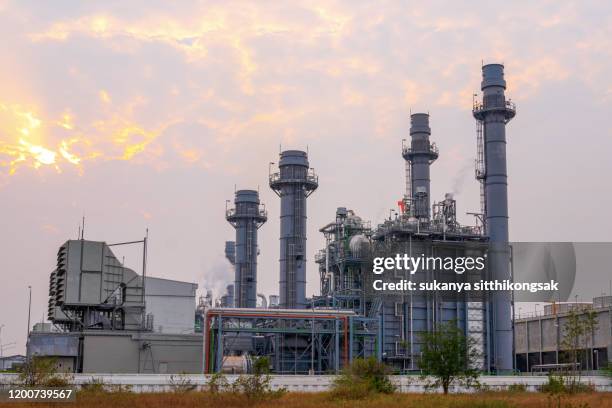 gas turbine electrical power plant with twilight. - gas turbine electrical power plant stock pictures, royalty-free photos & images