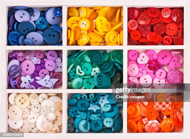 buttons on box with sewing set collection colorful arranged in a white wooden box - button sewing item stock-fotos und bilder