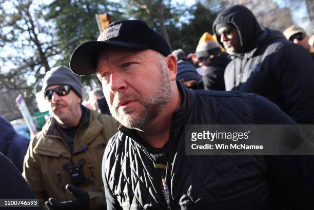 Radio show host Alex Jones joins thousands of gun rights advocates attending a rally organized by The Virginia Citizens Defense League on Capitol...