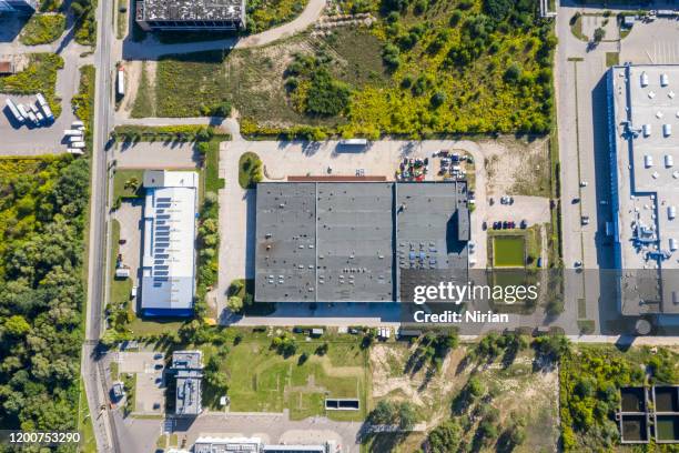 aerial view of industrial units - factory exterior stock pictures, royalty-free photos & images