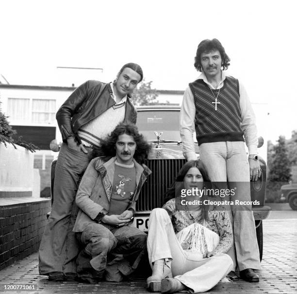 British heavy metal band Black Sabbath L-R Bill Ward, Geezer Butler, Ozzy Osbourne, and Tony Iommi pose for a portrait in 1975 in London, UK.