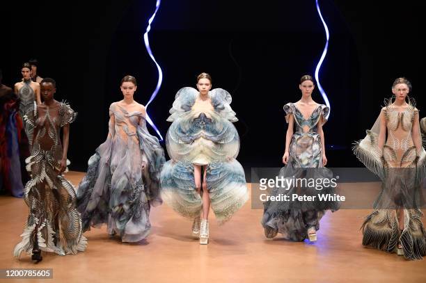Models walk the runway during the Iris Van Herpen Haute Couture Spring/Summer 2020 show as part of Paris Fashion Week on January 20, 2020 in Paris,...