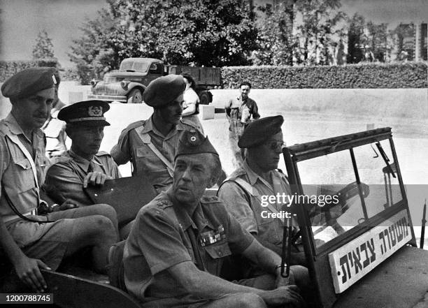 The United Nations mediator in charge of Israeli-Arab conflict Count Folke Bernadotte of Sweden is seen in September 1948 in a jeep in Haïfa with an...