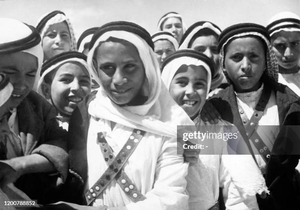 An undated picture, probably taken in 1948, shows Palestinian children from Beer-Sheba expecting the UNSCOP (United Nations Special Committe on...