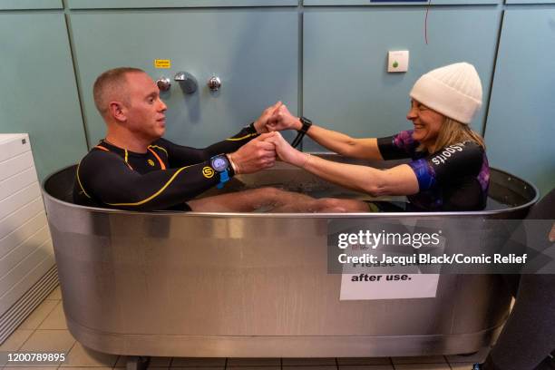 Rob Rinder and Louise Minchin step into an ice bath on February 7, 2020 in London, England. The celebrities are training for Sport Relief: On Thin...