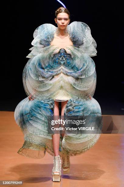 Model walks the runway during the Iris Van Herpen Haute Couture Spring/Summer 2020 fashion show as part of Paris Fashion Week on January 20, 2020 in...