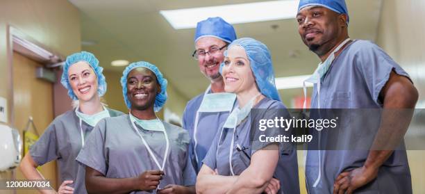 medical team in hospital - nurse hat stock pictures, royalty-free photos & images