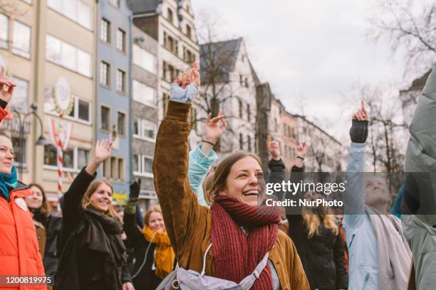 Women takes part in one billion rising campaign dance in the city center of Cologne, Germany on February 14, 2020.