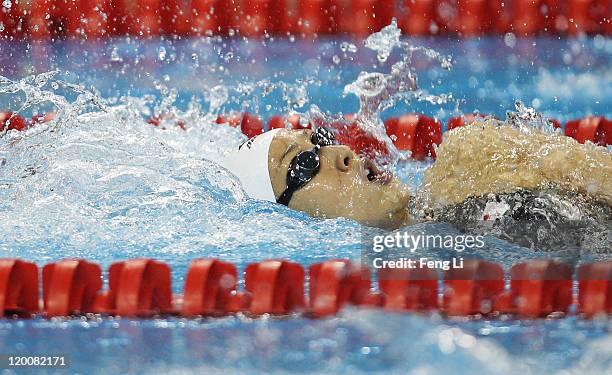 Aya Terakawa of Japan competes in heat one of the Women's 4 x 100m Medley Relay heats during Day Fifteen of the 14th FINA World Championships at the...