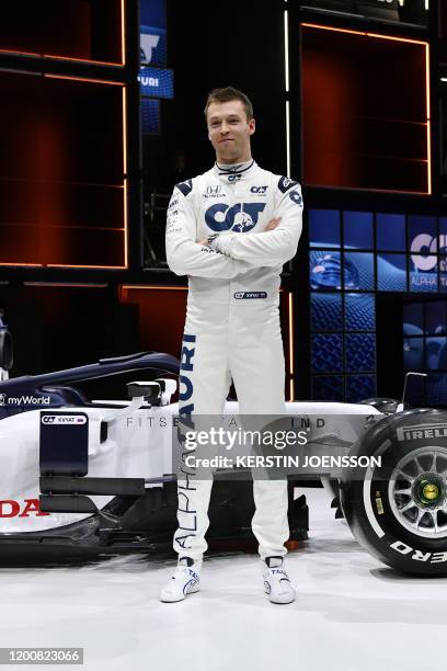 Alpha Tauri's Russian driver Daniil Kvyat poses in front of the new car at the presentation of Italian Formula One racing team Alpha Tauri at Hangar...