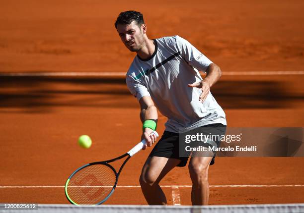 Juan Ignacio Londero of Argentina hits volley during his Men's Singles match against Guido Pella of Argentina during day 5 of ATP Buenos Aires...