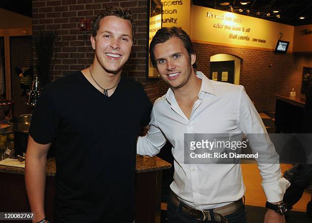 Daytona 500 Trevor Bayne and WINNER Indianapolis 500 Dan Wheldon meet for the first time backstage at the Taylor Swift concert at Conseco Fieldhouse...