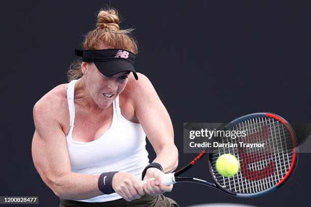 Madison Brengle of the United States plays a backhand during her Women's Singles first round match against Caroline Garcia of France on day two of...