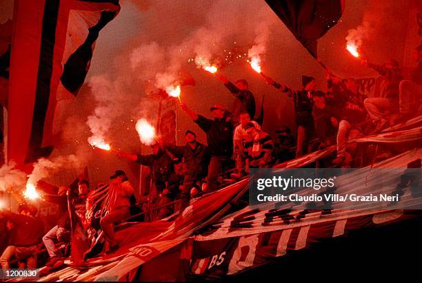 Milan fans light flares during the Serie A match against Inter Milan at the San Siro in Milan, Italy. \ Mandatory Credit: Claudio Villa /Allsport