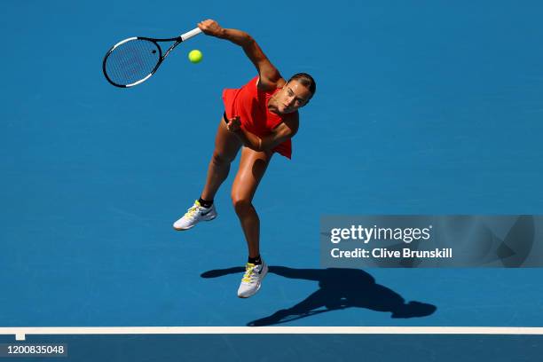 Anna Karolina Schmiedlova of Slovakia serves during her Women's Singles first round match against Belinda Bencic of Switzerland on day two of the...